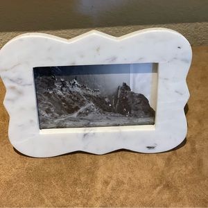 Scalloped marble picture frame